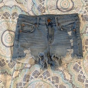 Light wash American Eagle shorts.